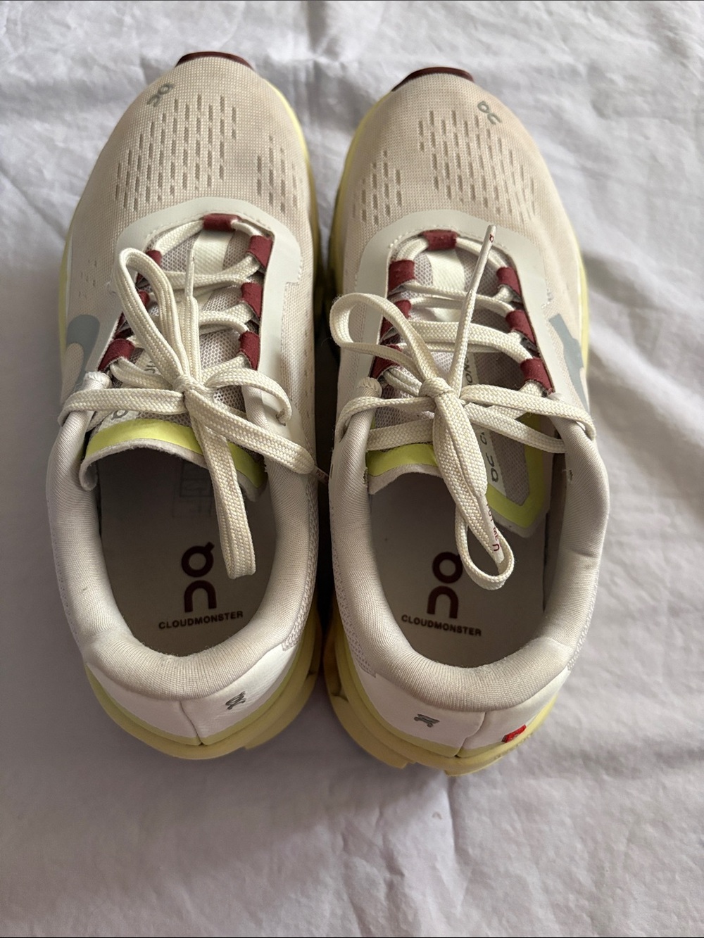 On Running Cloudmonster Sneakers in Cream with Yellow and Maroon Accents